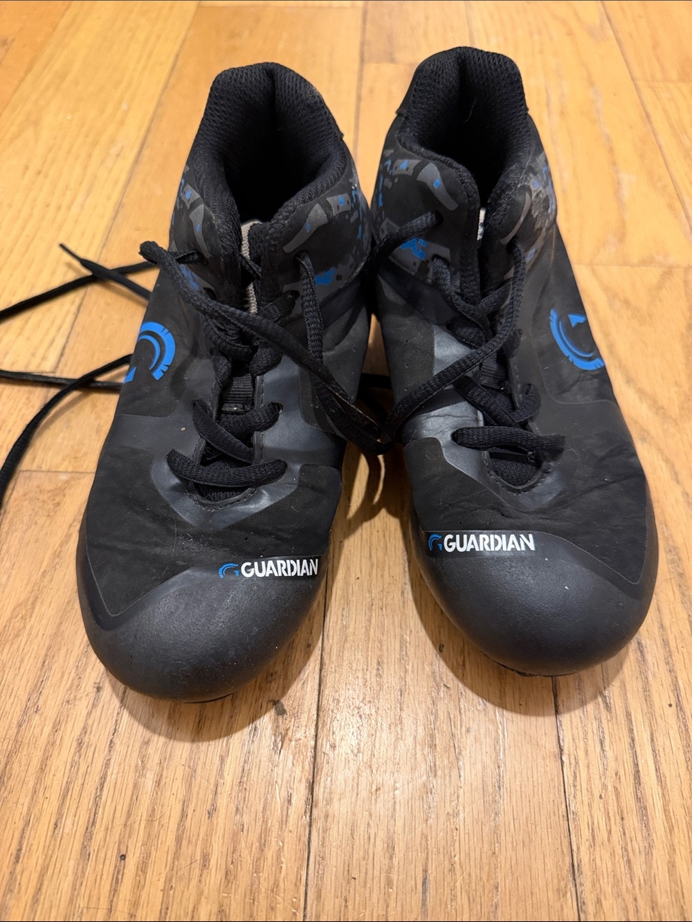 Kids' Guardian Black baseball cleats Shoes with Blue Accents